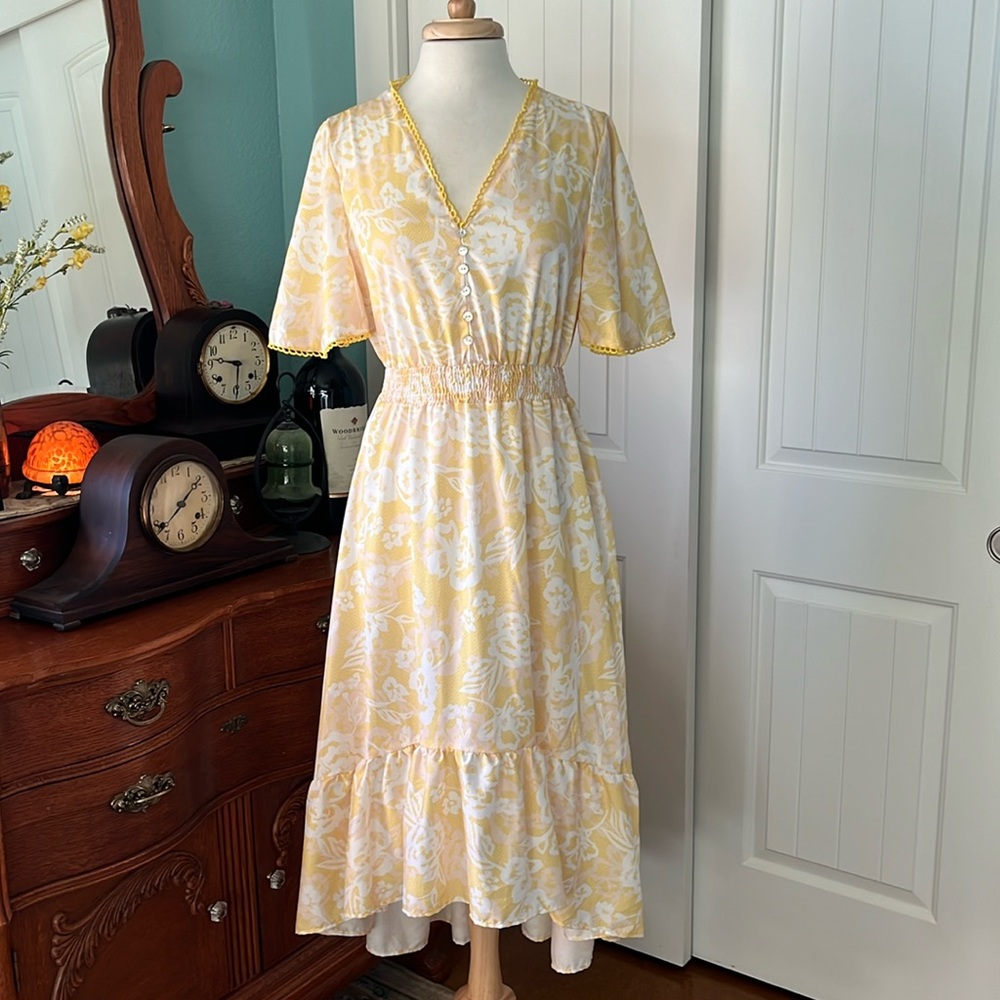 Large yellow and white floral dress